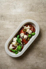 salad with tomatoes, mozzarella and basil
