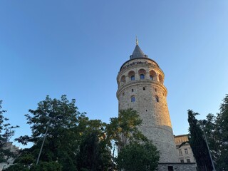 Evening view of the Galata Tower (Galata Kulesi) in Istanbul, Turkey. Built in the 14th century by...
