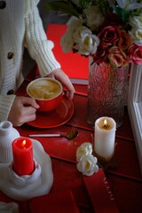 stilllife in red and white, coffee in red cup


