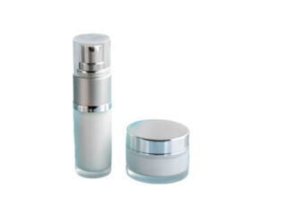 White cosmetic bottles and jar with silver accents isolated on a transparent background beauty skincare
