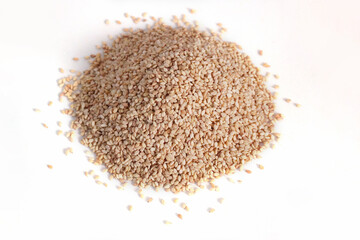Organic White Sesame seeds or Til on white background.