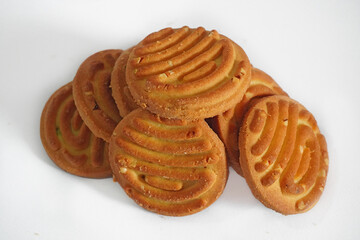 cookies biscuits on a white plate isolated on white background.