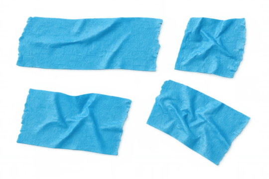Blue masking tape fragments crumpling, lying scattered on transparent surface, showcasing adhesive texture and design potential
