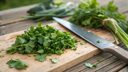 Freshly Chopped Cilantro on Wooden Cutting Board with Knife