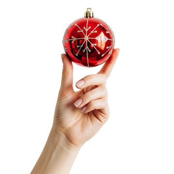 hand holding a red christmas ornament on Isolated transparent background png. generated with AI