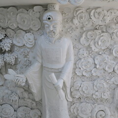 Mosaic art in the large white Buddha in Chiang Rai