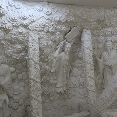 Mosaic art in the large white Buddha in Chiang Rai