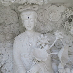 Mosaic art in the large white Buddha in Chiang Rai