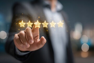 Businessperson's hand touches glowing golden stars, signifying excellent feedback