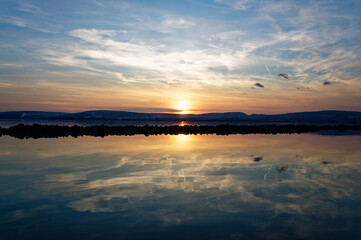 Sunset over Lake Balaton, a picturesque scene of tranquility and beauty.