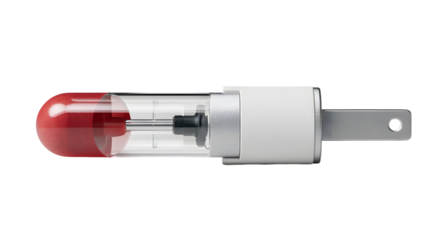 A close up of a white and clear device with a red tip on a black background in a studio setting