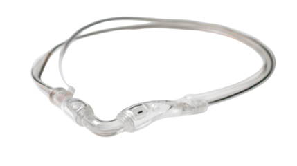 A close up shot of a clear nasal cannula oxygen delivery system on a black background in studio light