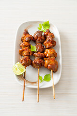 grilled chicken gizzard skewer with herbs and spices