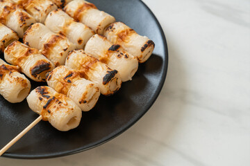 grilled tube shaped fish paste cake skewe or tube squid skewer