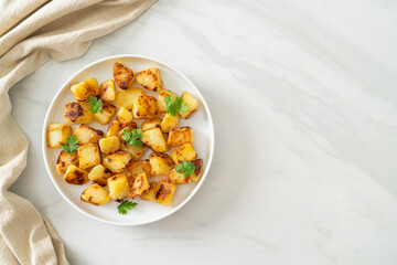 Roasted or grilled potatoes  on plate