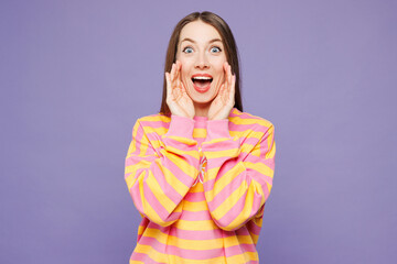 Young woman she wears yellow sweatshirt casual clothes scream sharing hot news about sales discount...