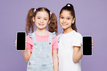Little two friends kids children girls 9-10 years old wear casual clothes together hold in hand use...