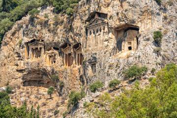 Ancient Lycian rock tombs of Kaunos carved into cliffs in Dalyan, Turkey