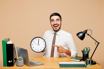 Young happy successful employee business man wear white shirt tie sit work at office desk with pc...