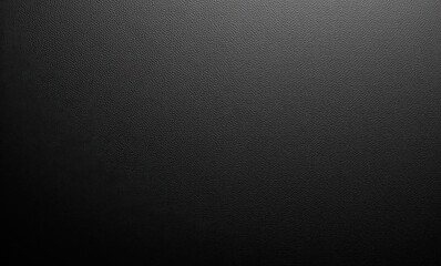 Black textured background for versatile design applications.