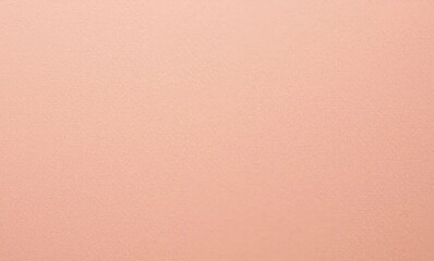 Soft peach-colored textured background for creative projects and designs.