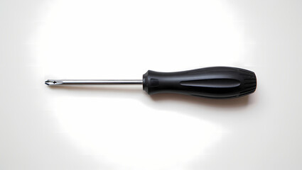 Fototapeta premium Flathead Screwdriver with a Black Ergonomic Handle on a White Background