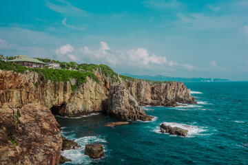 A striking coastal landscape of the Sandanbeki Cliffs in Shirahama, Wakayama Prefecture, Japan.