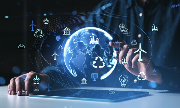 Sustainable technology interface with globe and renewable energy icons displayed.