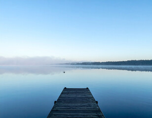 Fototapeta premium Minimalist Lake with Dock and Misty Morning Reflections