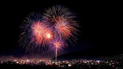 Spectacular Fireworks Display Illuminating Night Sky Over City, Celebrating Festive Occasion with Vibrant Colors