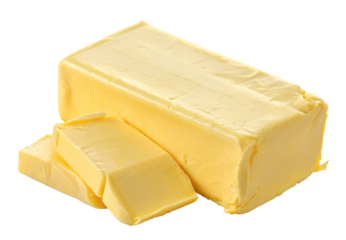 Fresh creamy butter block sliced into pieces for baking and cooking delicious meals at home
