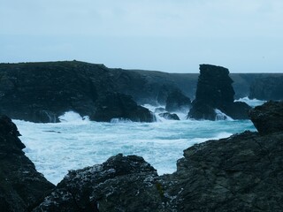 Crashing Waves on Rocky Coastline