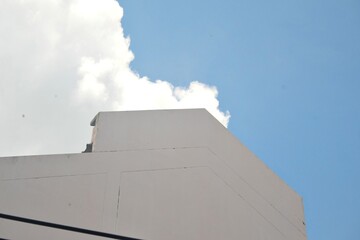Tall buildings in the city contrast with the sky
