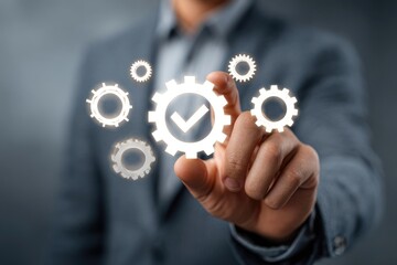 Businessman touches glowing gears with checkmark, representing successful process