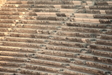 Part of an ancient amphitheater with a stone staircase.