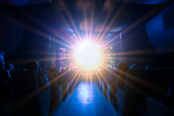 Bright light display captivates audience during evening performance in an indoor venue