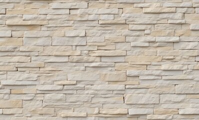 Close-up of a textured stone wall in soft beige tones, offering an elegant and modern look.