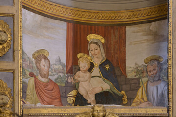 Fresco of the Virgin and Child with Saints Peter and Paul in San Lorenzo Church, Spello, Italy,...
