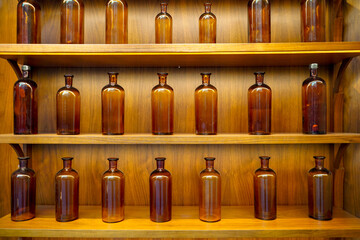 empty perfume glass bottles on shelves