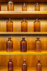 empty perfume glass bottles on shelves