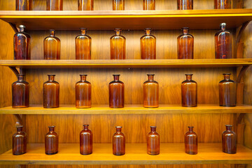 empty perfume glass bottles on shelves