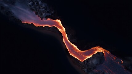 Aerial Drone View of Slow-Moving Lava River Flowing Through Dark Volcanic Landscape
