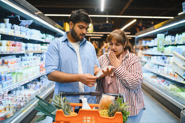 Indian couple shocked by grocery bill in supermarket, inflation and budgeting challenges