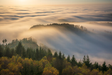 An aerial shot captures a spectacular temperature inversion in the Northern Black Forest, Germany.