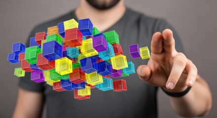 Colorful Cubes Hovering Around a Person's Hand, Representing Technology, Innovation, and Modern Digital Solutions