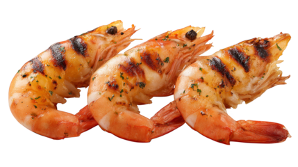 A detailed culinary presentation of three perfectly cooked vibrant pink and orange shrimps elegantly arranged in a row on a clean pristine white ceramic serving dish.