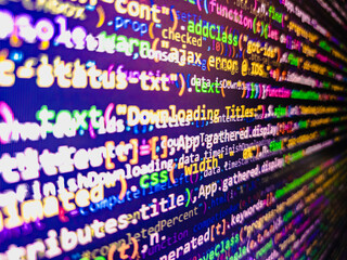 Blue banner with php language code on development monitor. PHP data source file. Programming preventing hacks in Internet security. Green is dominant color. Big data database app