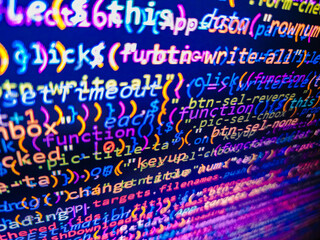 Program code and visual UI/UX. Modern digital data bits of technology, abstract background on monitor. Hi-tech modern screen of data, digits and chars on monitor. Code in green color