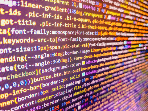 HTML5 in editor for website development. Data computer programmer bits stream of data bits. Screen close up