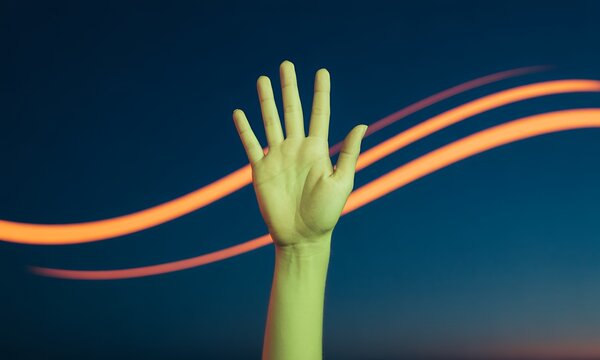 Hand Reaching Upward Against Vibrant Light Trails - Abstract Stock Photo